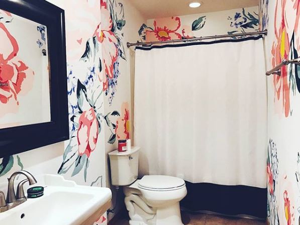 Flower Mural in a basement bathroom by Chrisara Designs